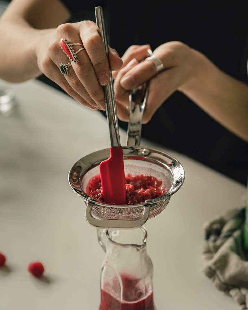 Straining The Raspberry Syrup