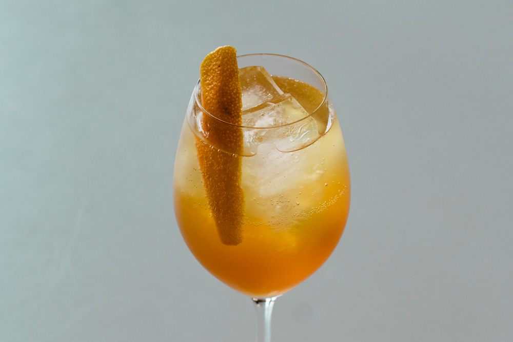 Amaro Spritz cocktail made with cocktail made with coganc and honey