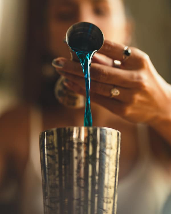 pouring blue curacao
