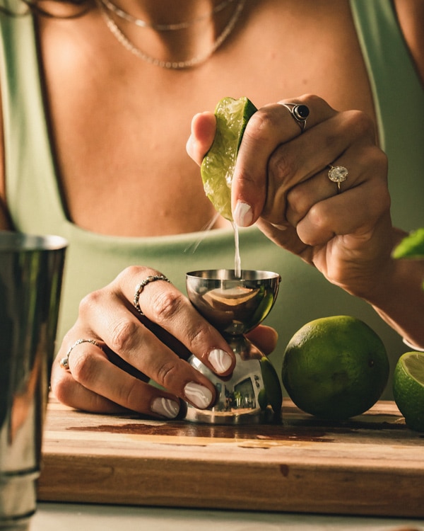 squeezing fresh lime juice